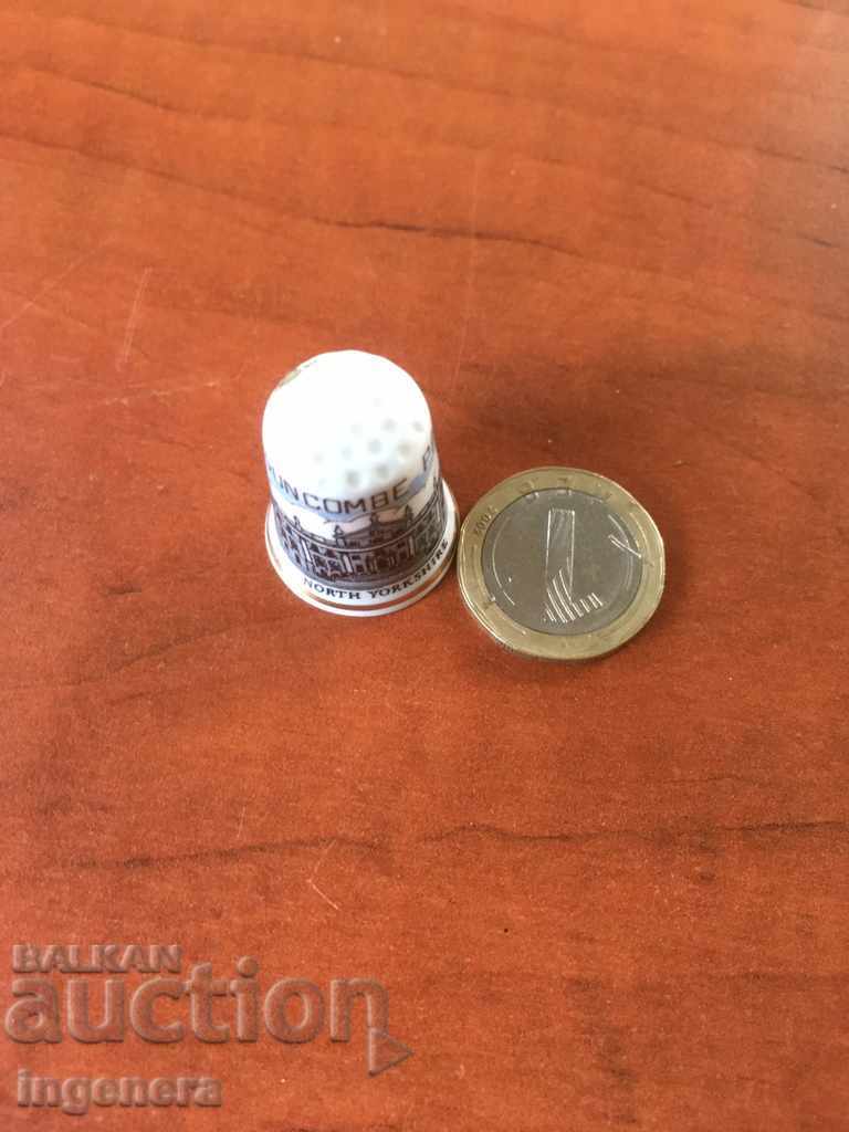 Auction Thimble porcelain Auction Thimble porcelain