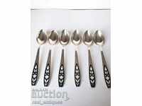 Old silver plated spoons with enamel