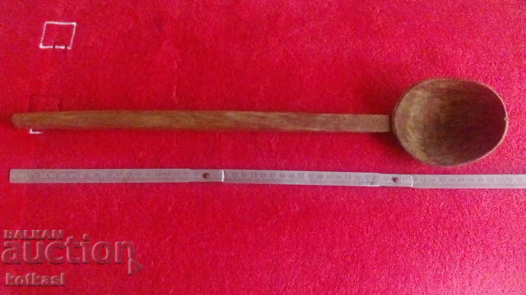 Old large wooden spoon ladle