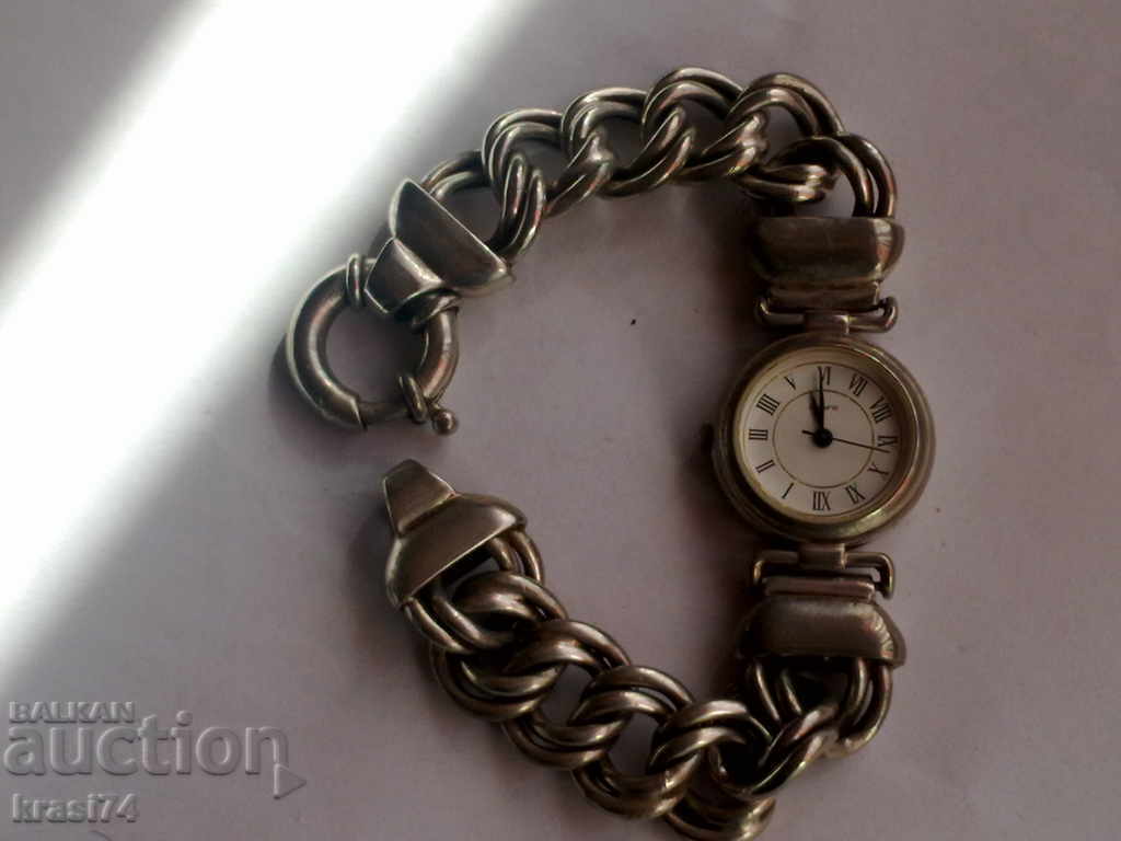 A silver watch A silver watch