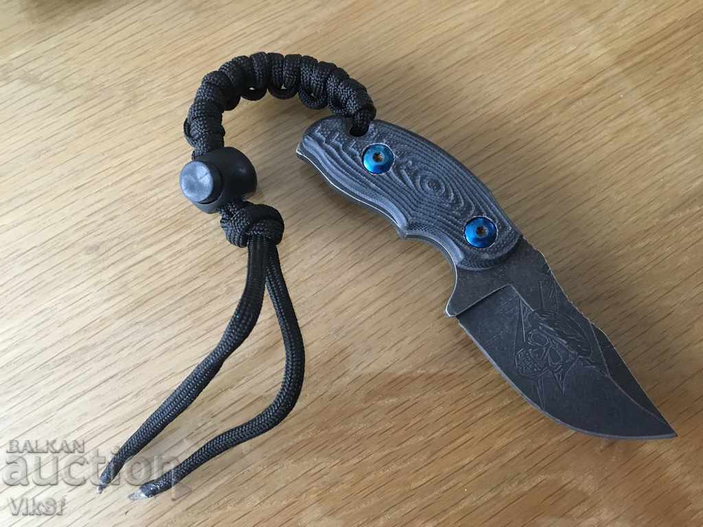 Auction Knife / PIRATE / type SURVIVAL - 55x120 mm, paracord Auction Knife / PIRATE / type SURVIVAL - 55x120 mm, paracord