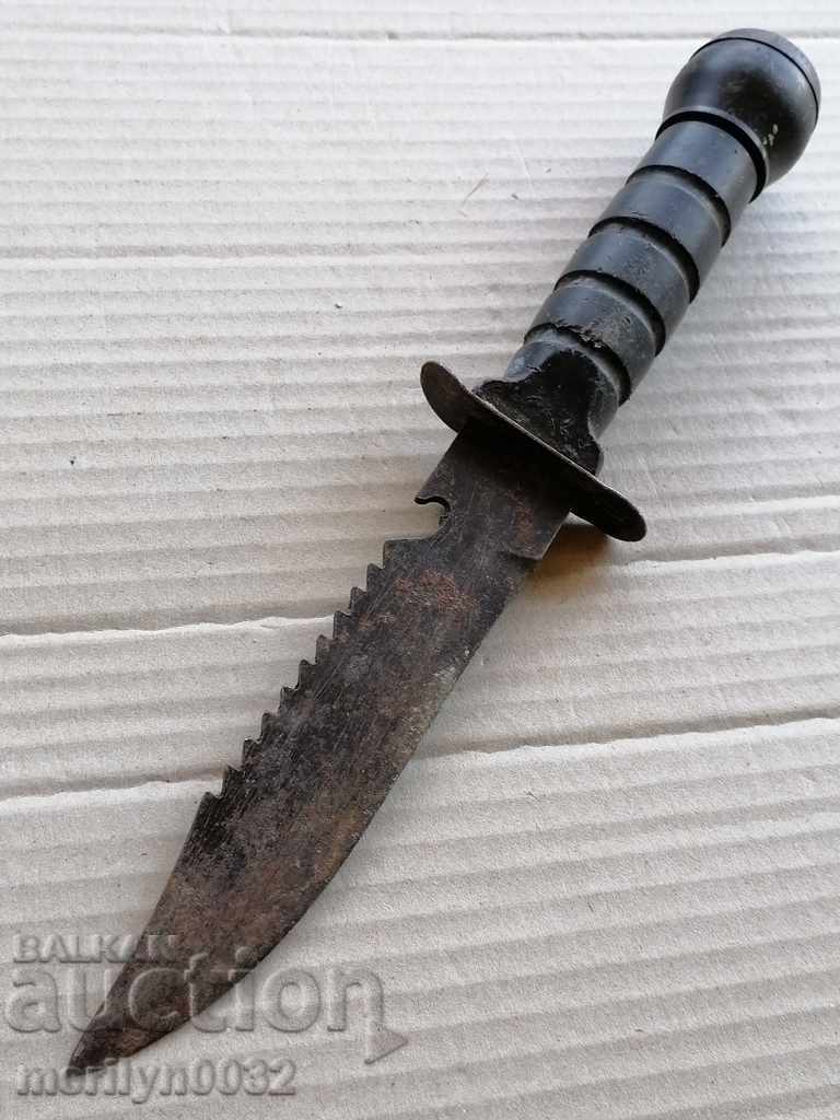 Old Rambo knife with teeth for cutting blade