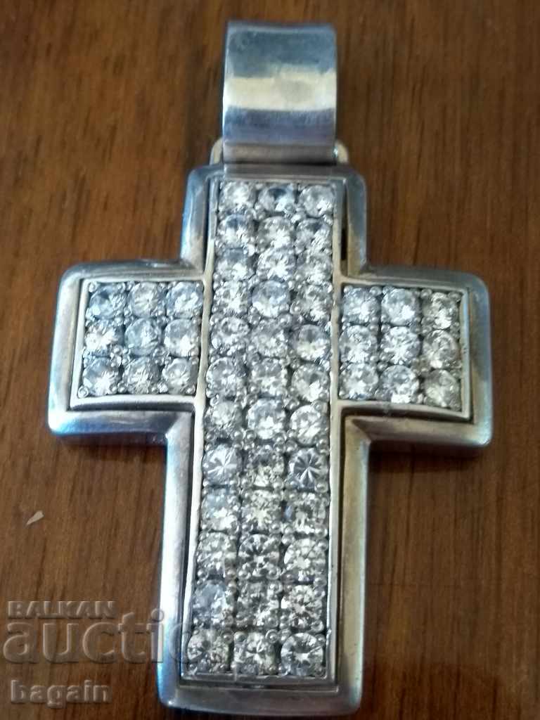 A unique silver cross.