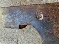 Old ax with stamped marking tool wrought iron