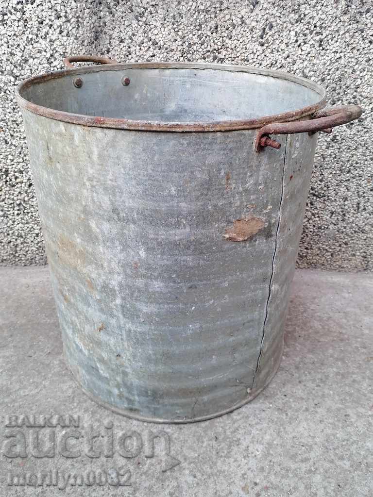 Old metal rubber bucket, canister 50 liters