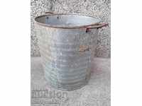 Old metal rubber bucket, canister 50 liters