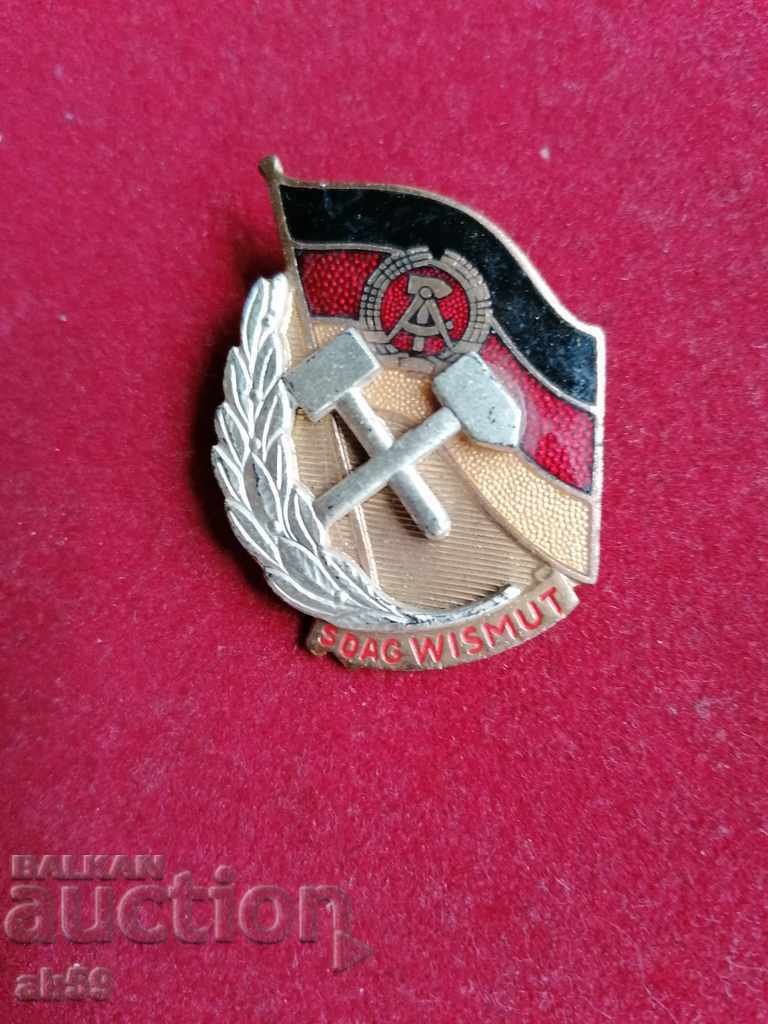 Insigna RDG a „SDAG WISMUT” - Societatea Germană Sovietică.