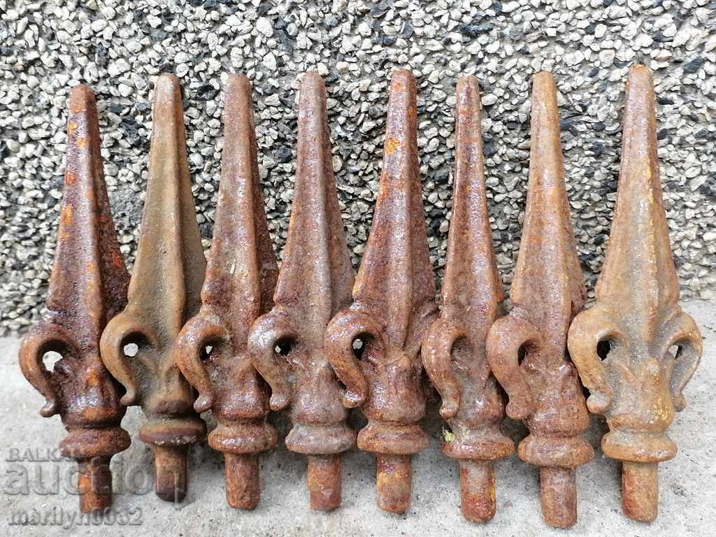 Delivery of Stylized lilies figured cast iron figure of metal