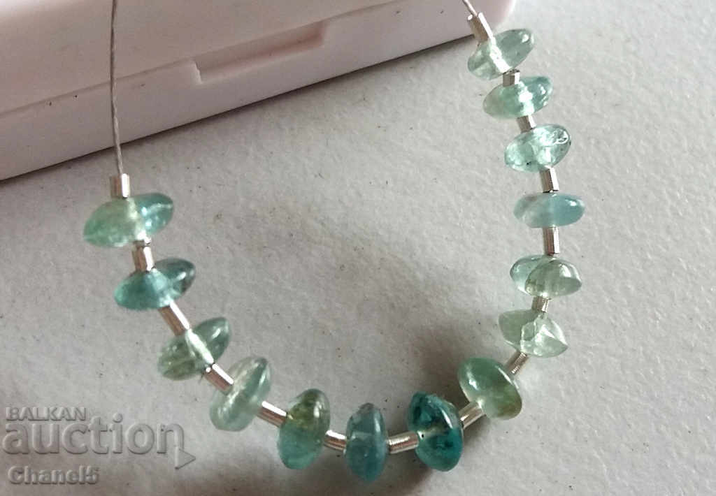 Auction NATURAL NEON BLUE-GREEN APATITE - CONNECTION - 7.00 kt (205) Auction NATURAL NEON BLUE-GREEN APATITE - CONNECTION - 7.00 kt (205)