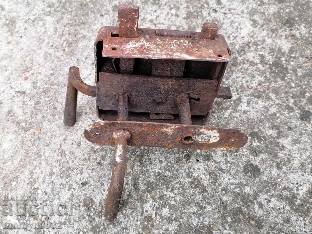 Delivery of Old lock without a key, latch from the beginning of the 20th century Delivery of Old lock without a key, latch from the beginning of the 20th century
