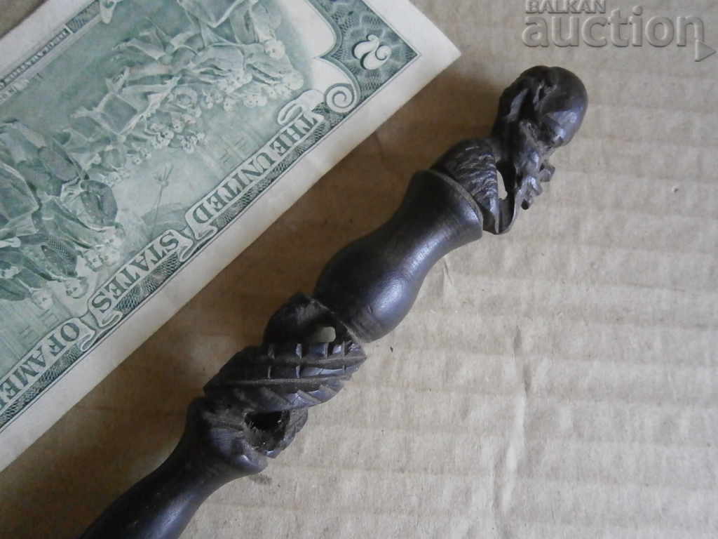 Auction cigarette butt figurine Auction cigarette butt figurine