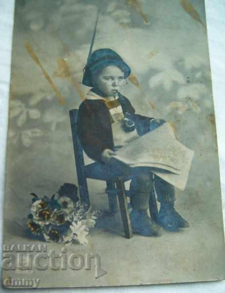 Old photo postcard child with pipe and newspaper Tsaribrod 1918 with price 15.00 BGN | € 7.67 Old photo postcard child with pipe and newspaper Tsaribrod 1918 with price 15.00 BGN | € 7.67