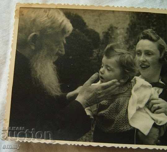 Old photo of a pop priest, mother with child with price 6.00 BGN | € 3.07