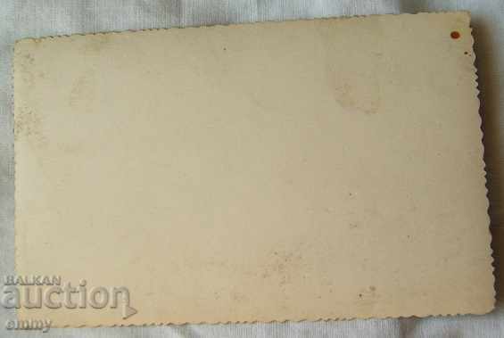 Delivery of Old photo of a pop priest, mother with child