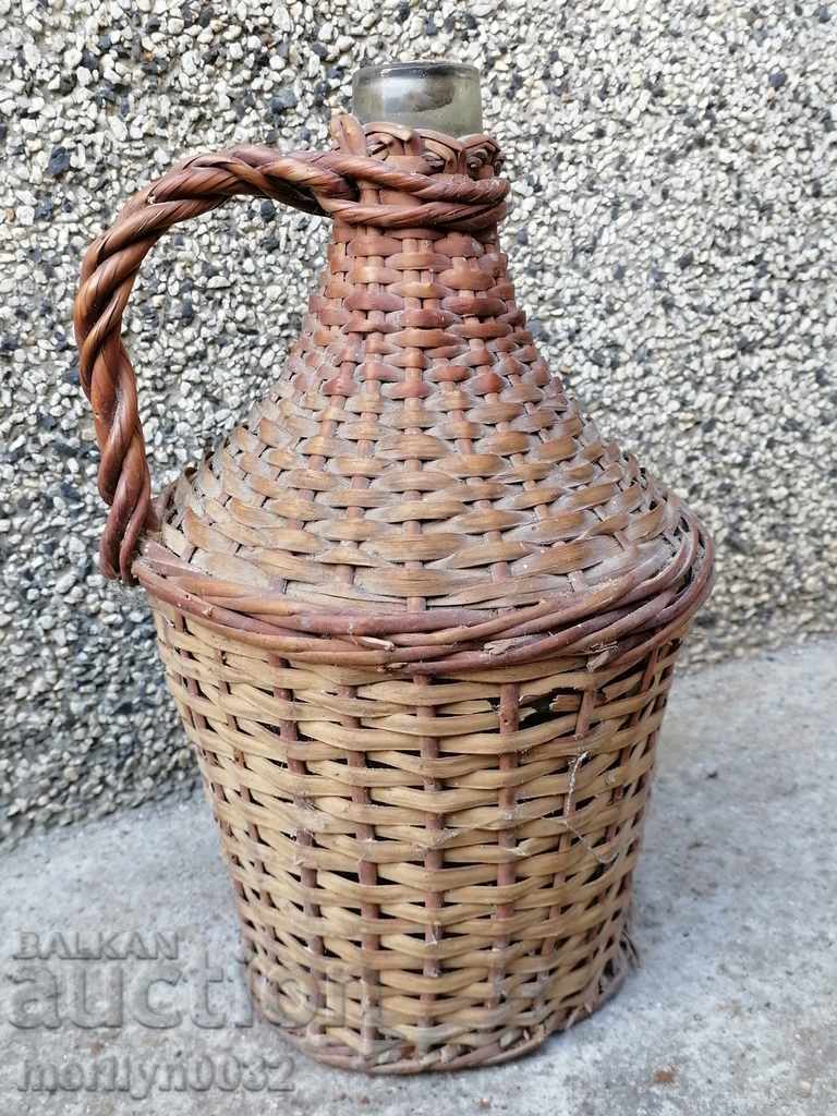 Veche damigeană împletită, butelie, sticlă