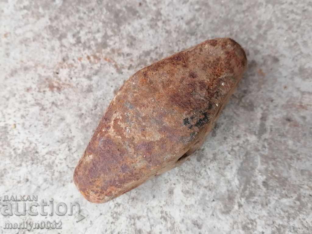 Delivery of An old stone hammer, a tool, a kink Delivery of An old stone hammer, a tool, a kink
