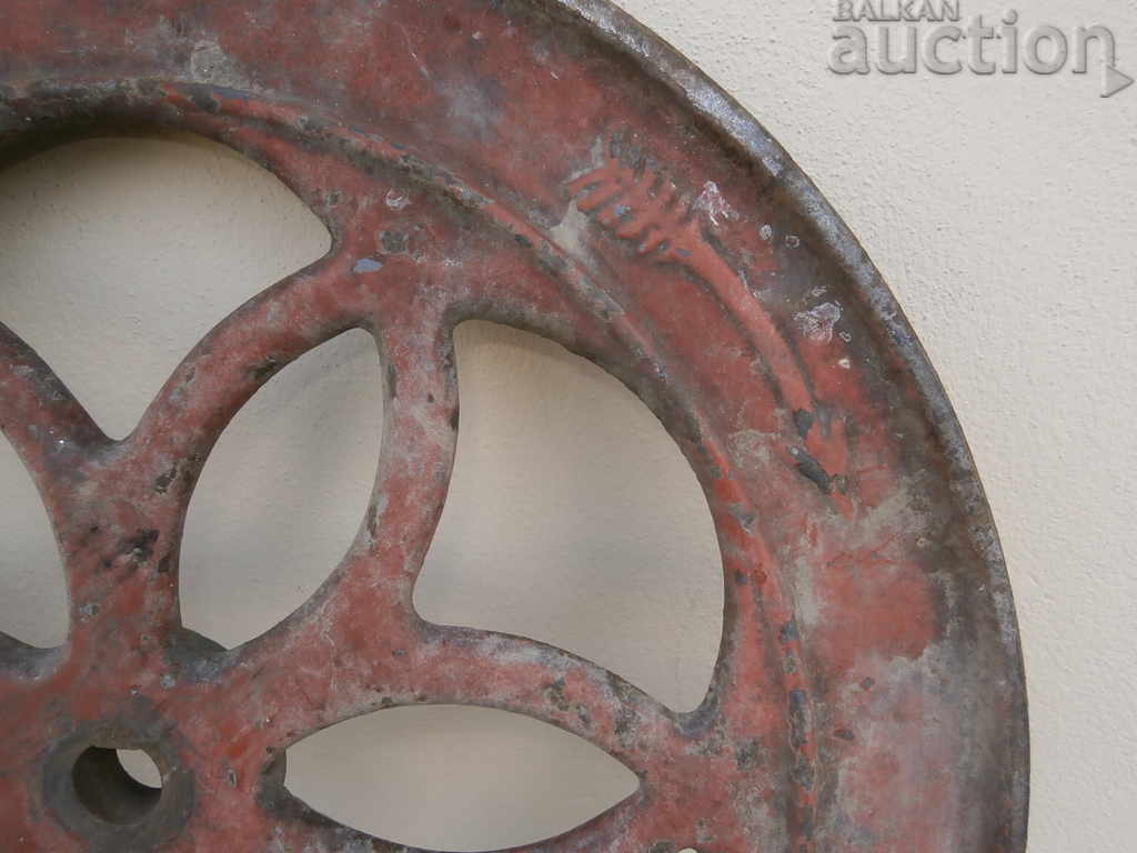 Delivery of antique large metal flywheel 19th century