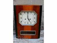AMBER WALL CLOCK WITH PENDULUM AND KEY FOR PREVENTION