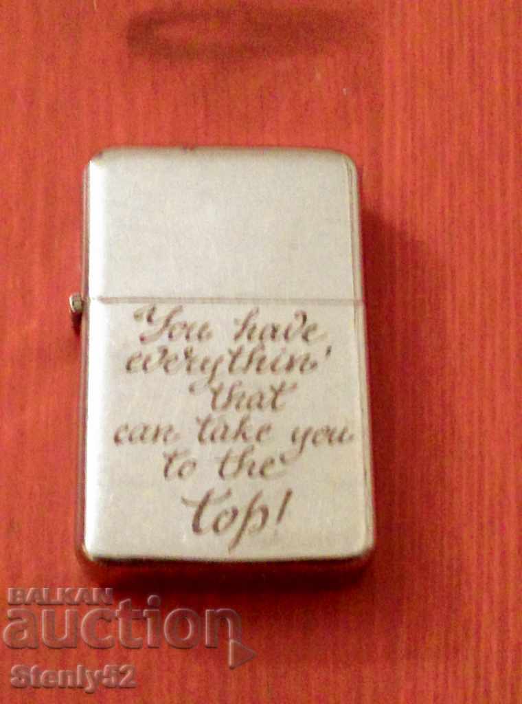 Petrol lighter with engraved wish