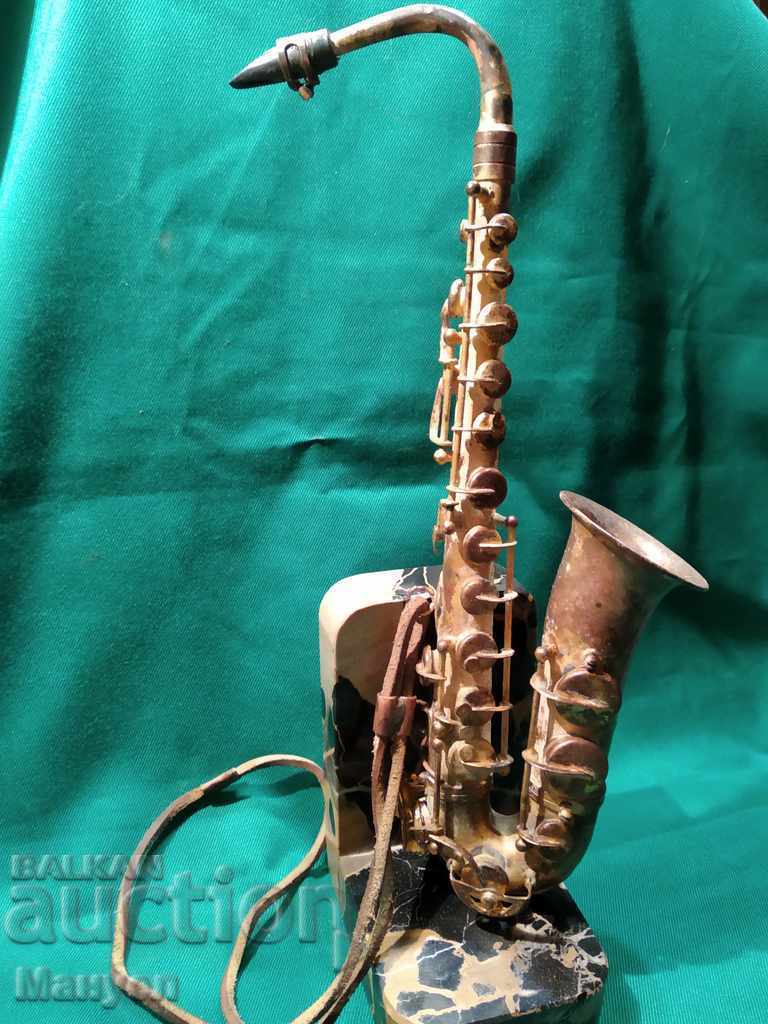 I am selling a unique miniature saxophone.RRRRR with price 200.00 BGN | € 102.26 I am selling a unique miniature saxophone.RRRRR with price 200.00 BGN | € 102.26