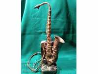 I am selling a unique miniature saxophone.RRRRR