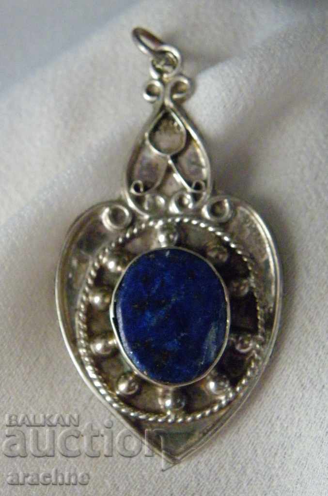 Large silver locket with lapis lazuli