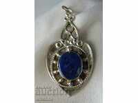 Large silver locket with lapis lazuli