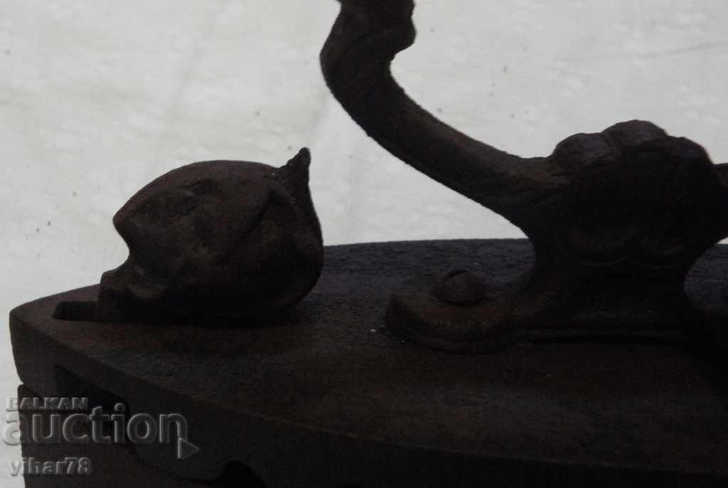 Auction  old iron on fire