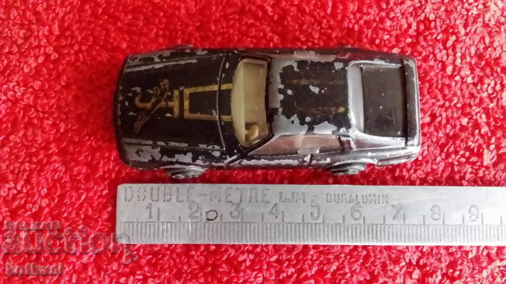 Old small metal Jaguar car Old small metal Jaguar car