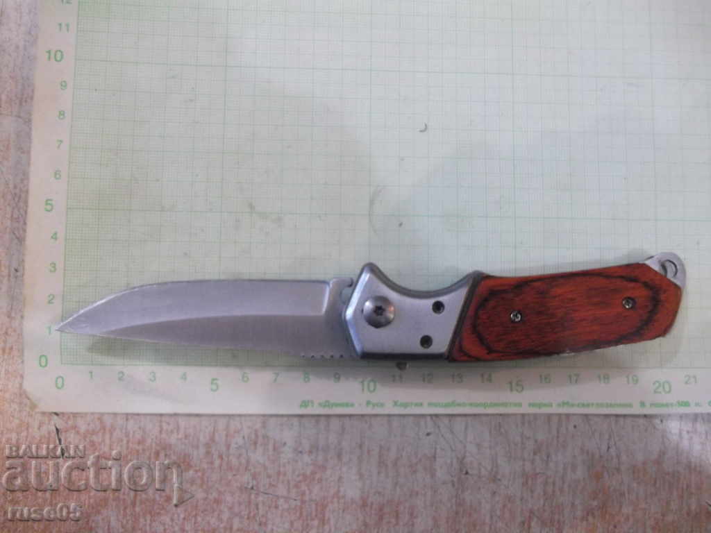 Auction Folding semi-automatic knife with case Auction Folding semi-automatic knife with case