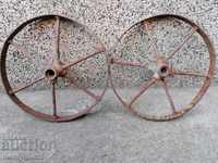 A pair of forged iron wheels