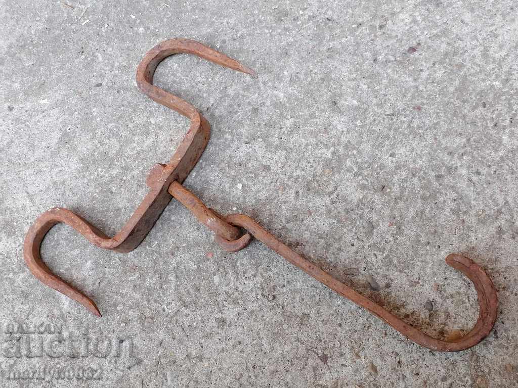 Auction  An old forged scraping hook, double twin