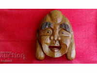 Masca rară din lemn masiv sculptat, mare și veche, a lui Buddha care râde