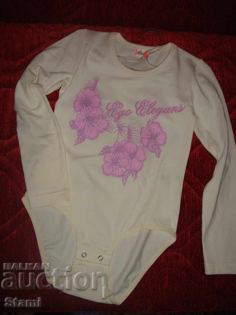 Body color cream for a girl with long sleeves with a print size 146