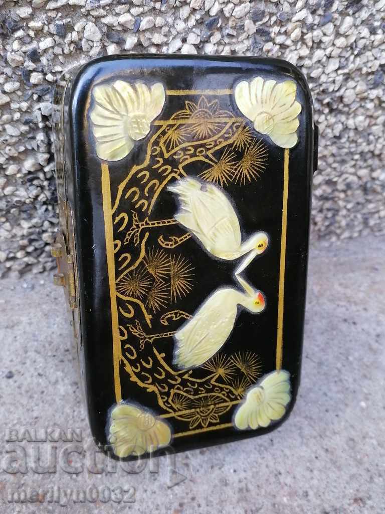 Old jewelry box with mother of pearl casket decoration