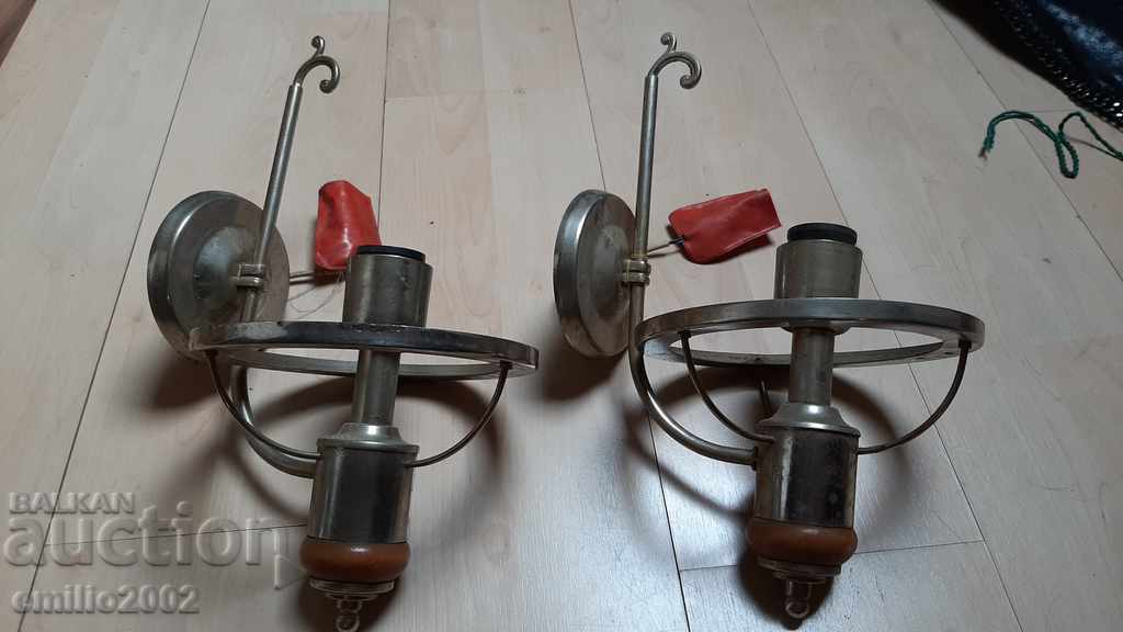 Two solid retro sconces