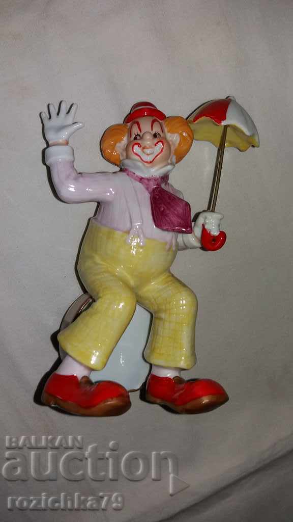 Auction Porcelain plastic clown figure Auction Porcelain plastic clown figure