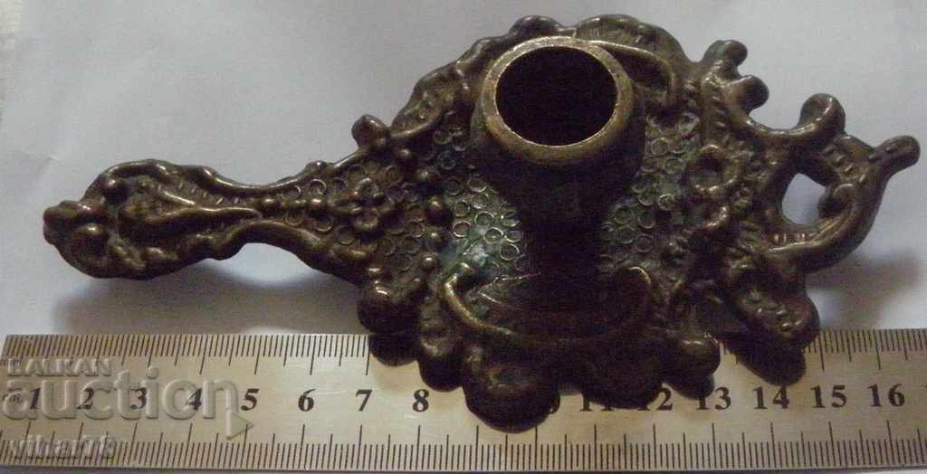 Auction  An old candlestick