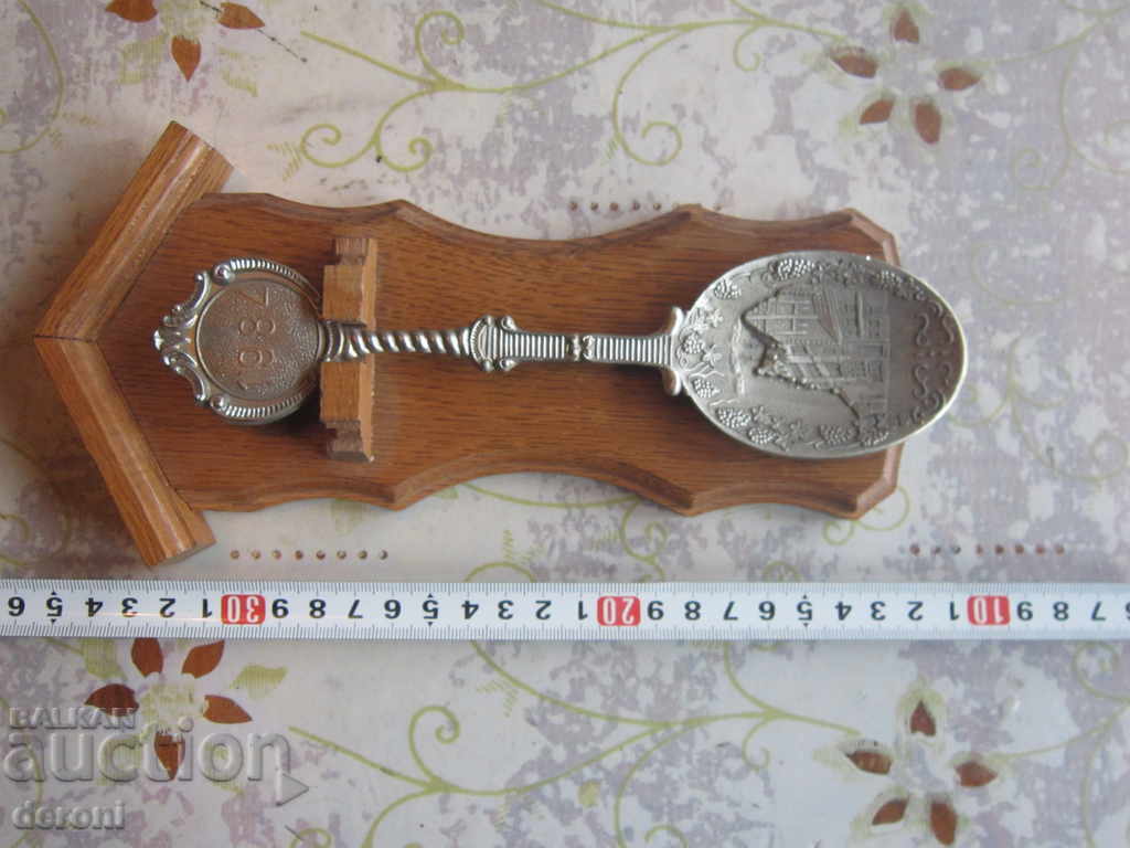 Unique pewter spoon with oak stand 1984 Pewter spoon