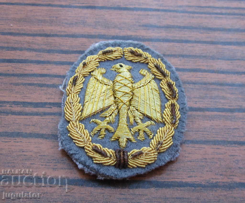 Παράδοση παλιά γερμανική στρατιωτική χρυσή λωρίδα σημάδι αετός