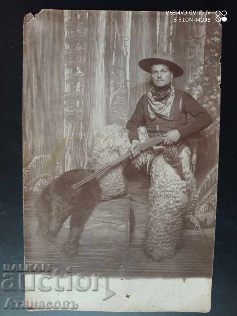 Old photo Cowboy bear hunter