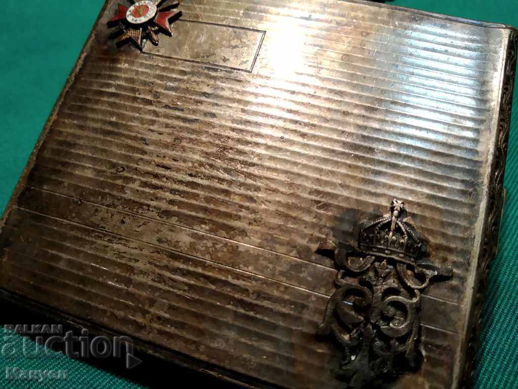 Auction  I'm selling an old officer's cigarette case.