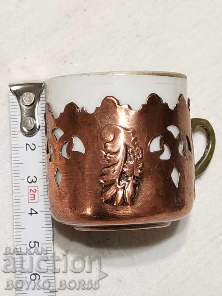 Cupa Markova din porțelan antic cu carcasă din cupru
