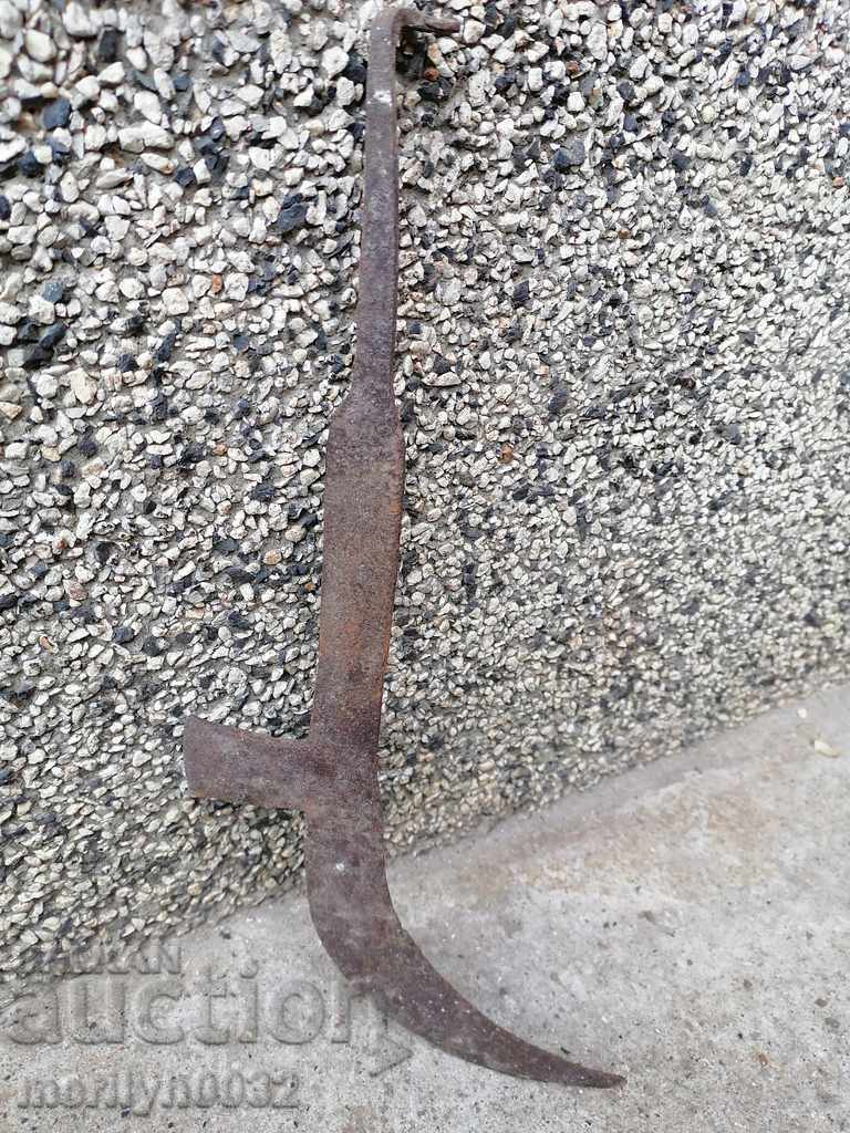 An old hand-forged hammer with primitive engravings, wrought iron with price 45.00 BGN | € 23.01