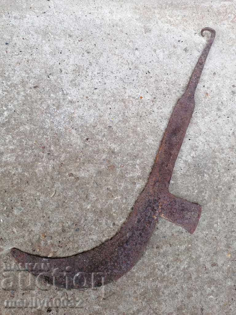 Auction  An old hand-forged hammer with primitive engravings, wrought iron