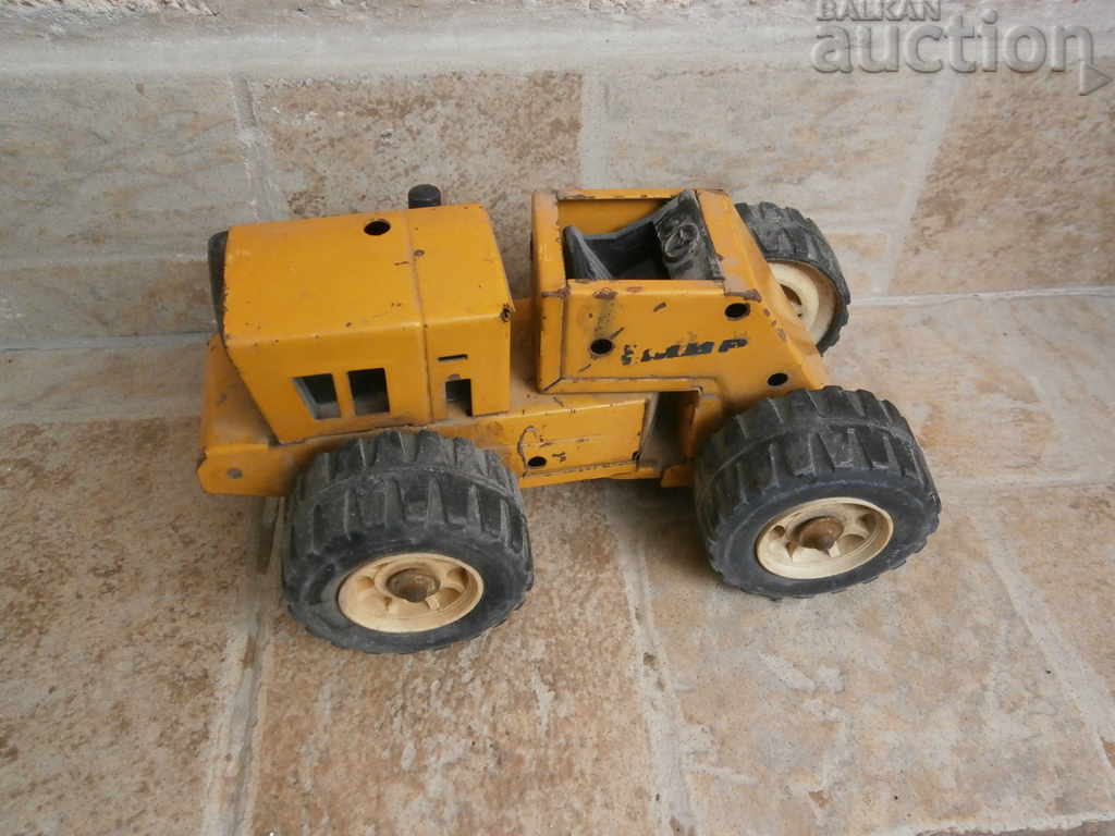 Auction metal toy soc fadroma tractor or excavator Auction metal toy soc fadroma tractor or excavator