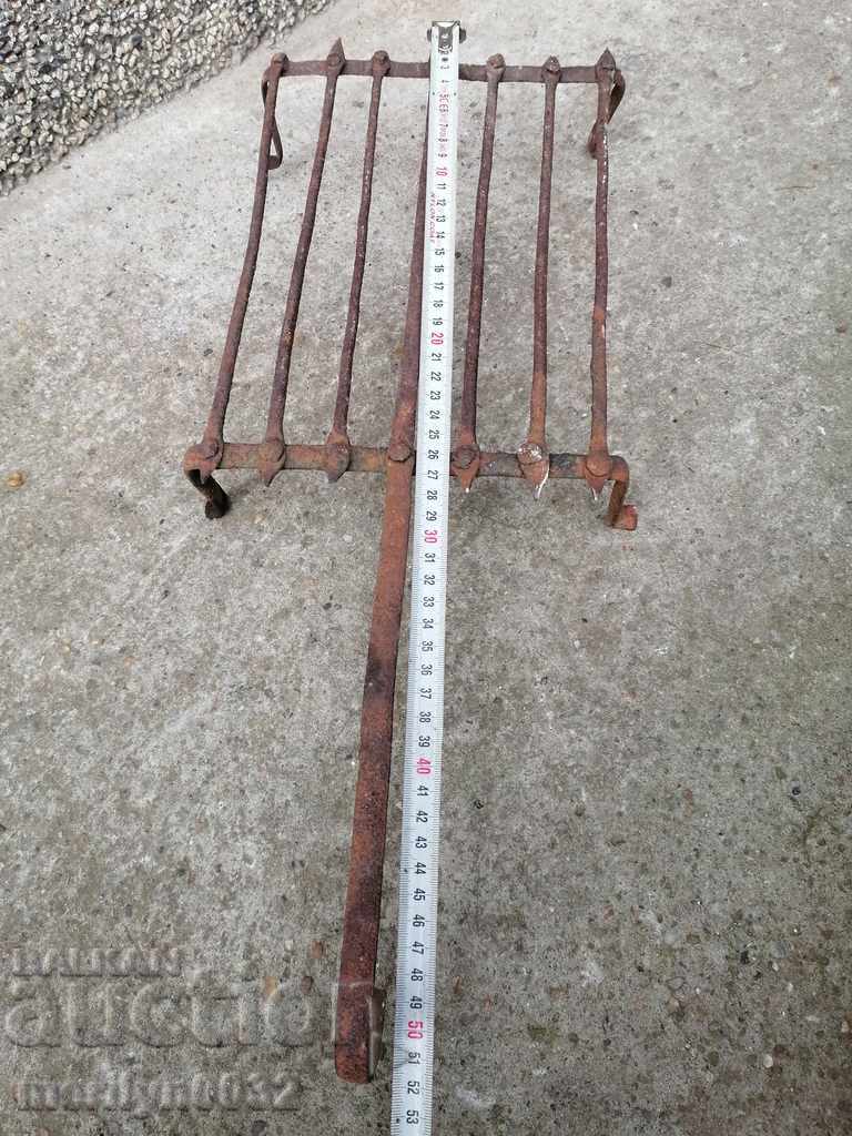 An old hand-forged grill, a steak, wrought iron - 5 An old hand-forged grill, a steak, wrought iron - 5