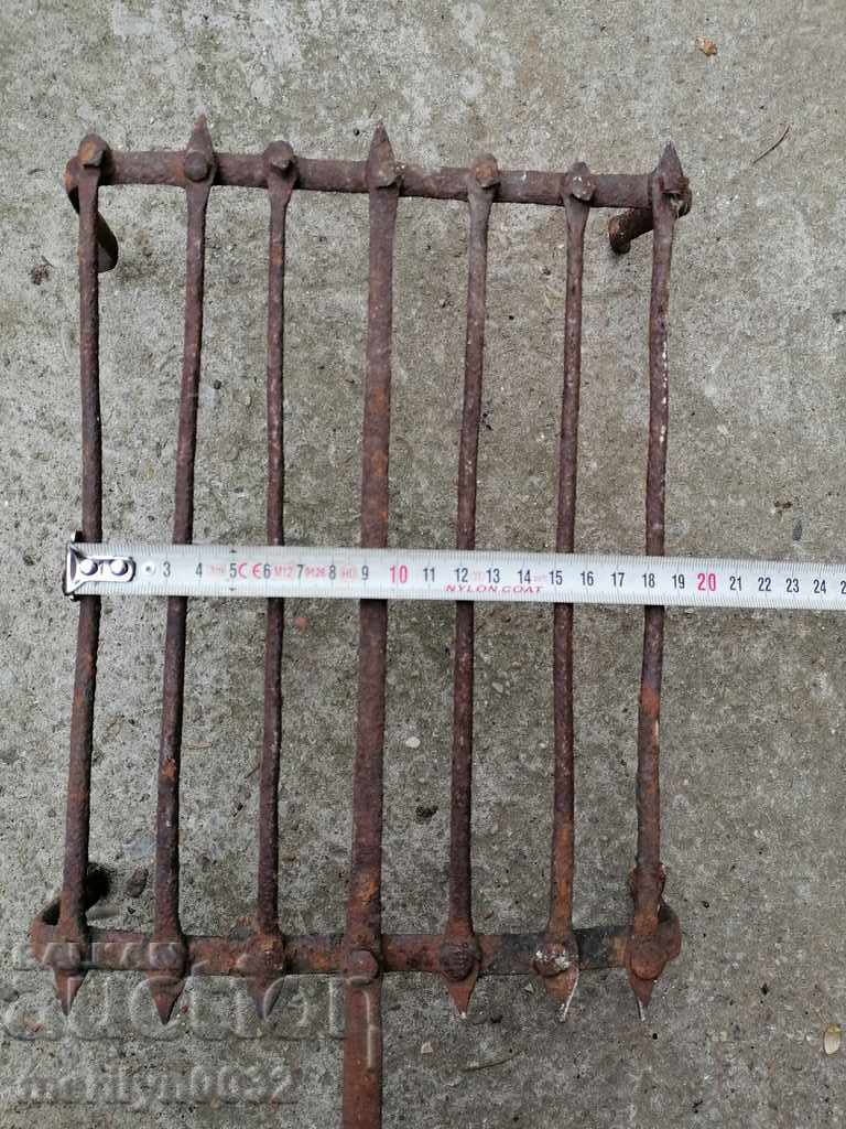 An old hand-forged grill, a steak, wrought iron - 6 An old hand-forged grill, a steak, wrought iron - 6