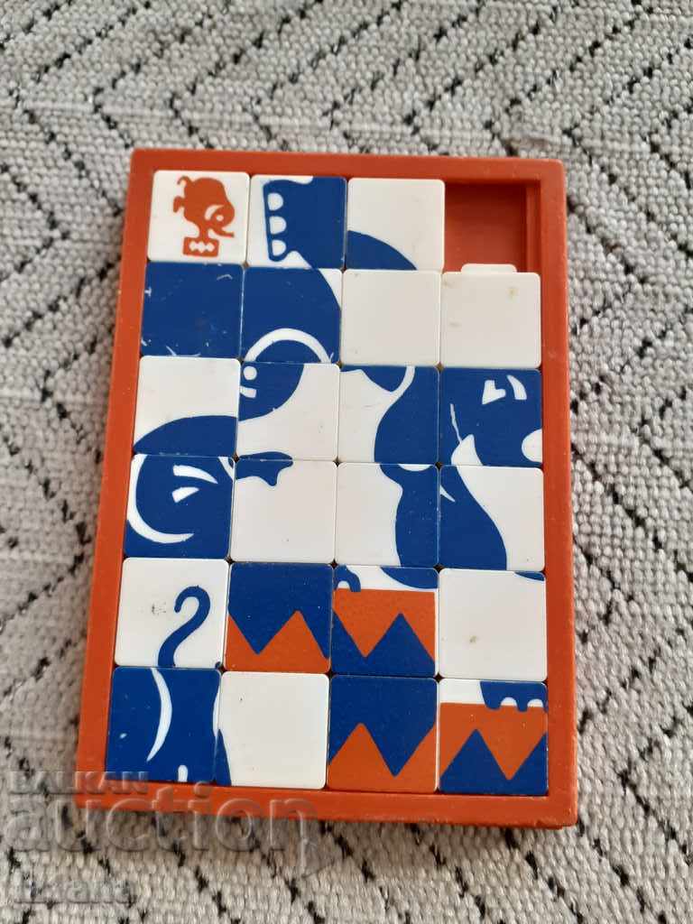 An old kid's play, a tile