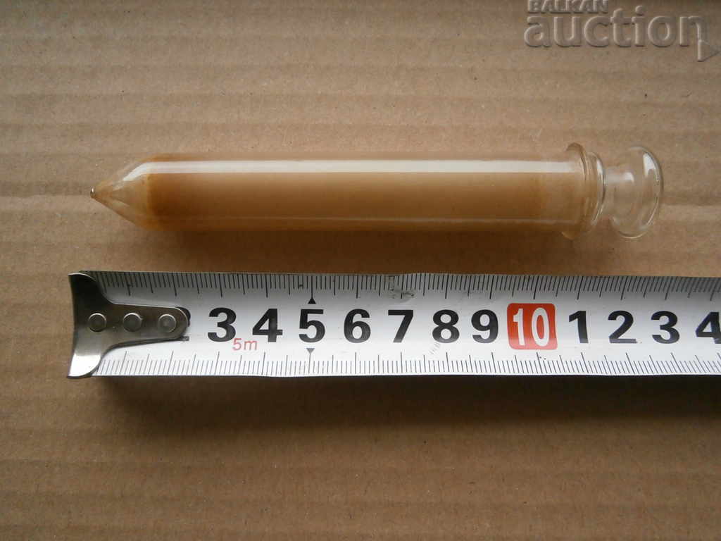 Delivery of antique glass syringe